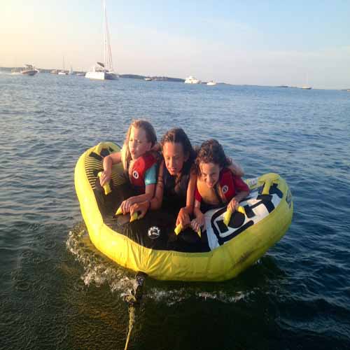 Kids tubing adventure aboard sailing charter Hamtons and montauk boat rental